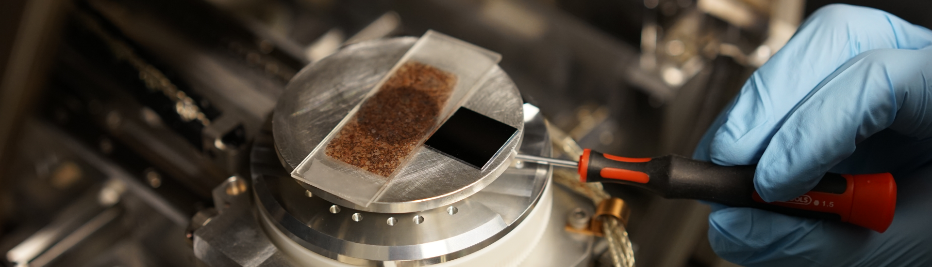 loading a thin section under a microscope